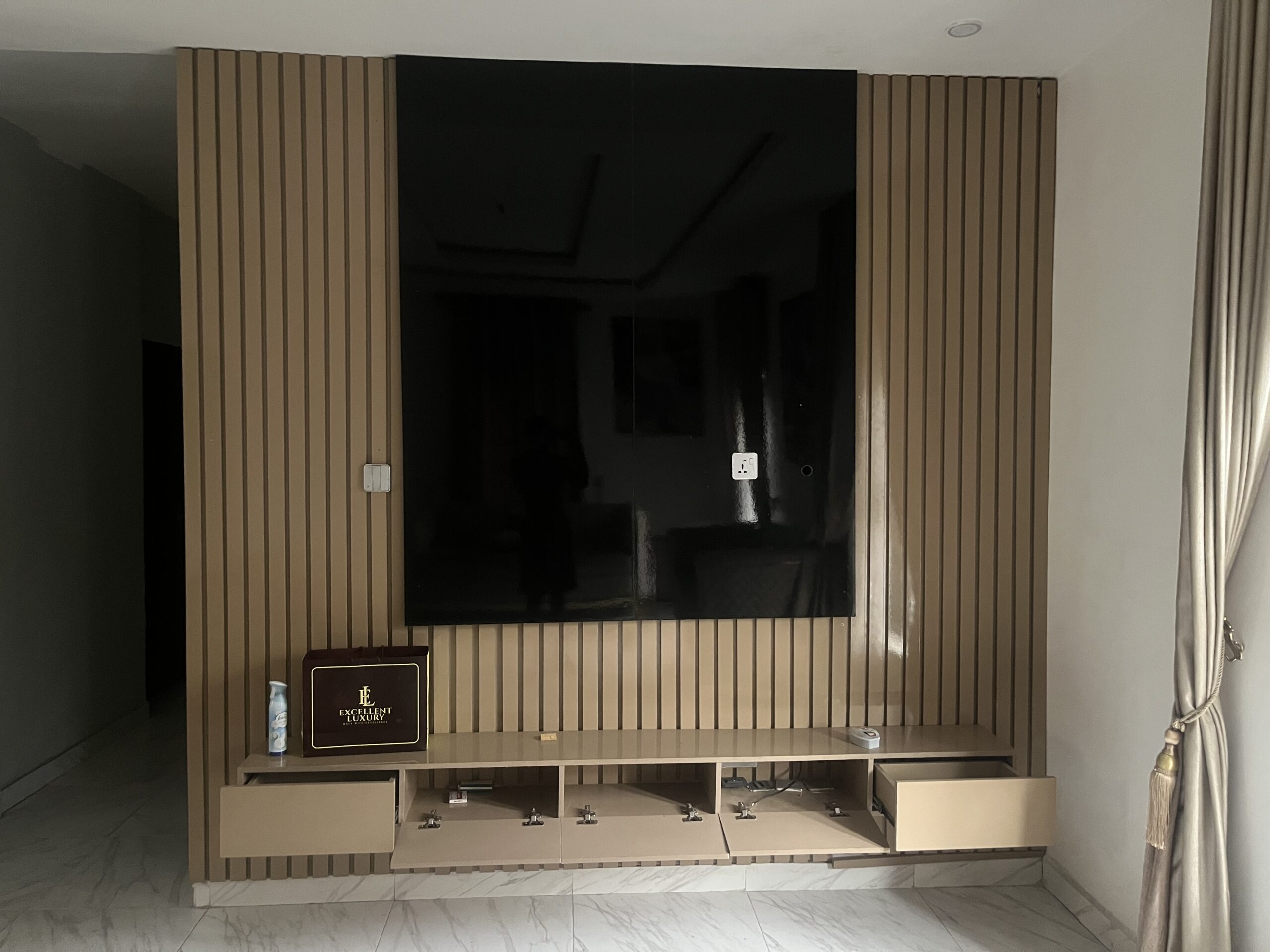 Neatly used TV console with good lighting