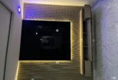 Neatly used TV console with good lighting
