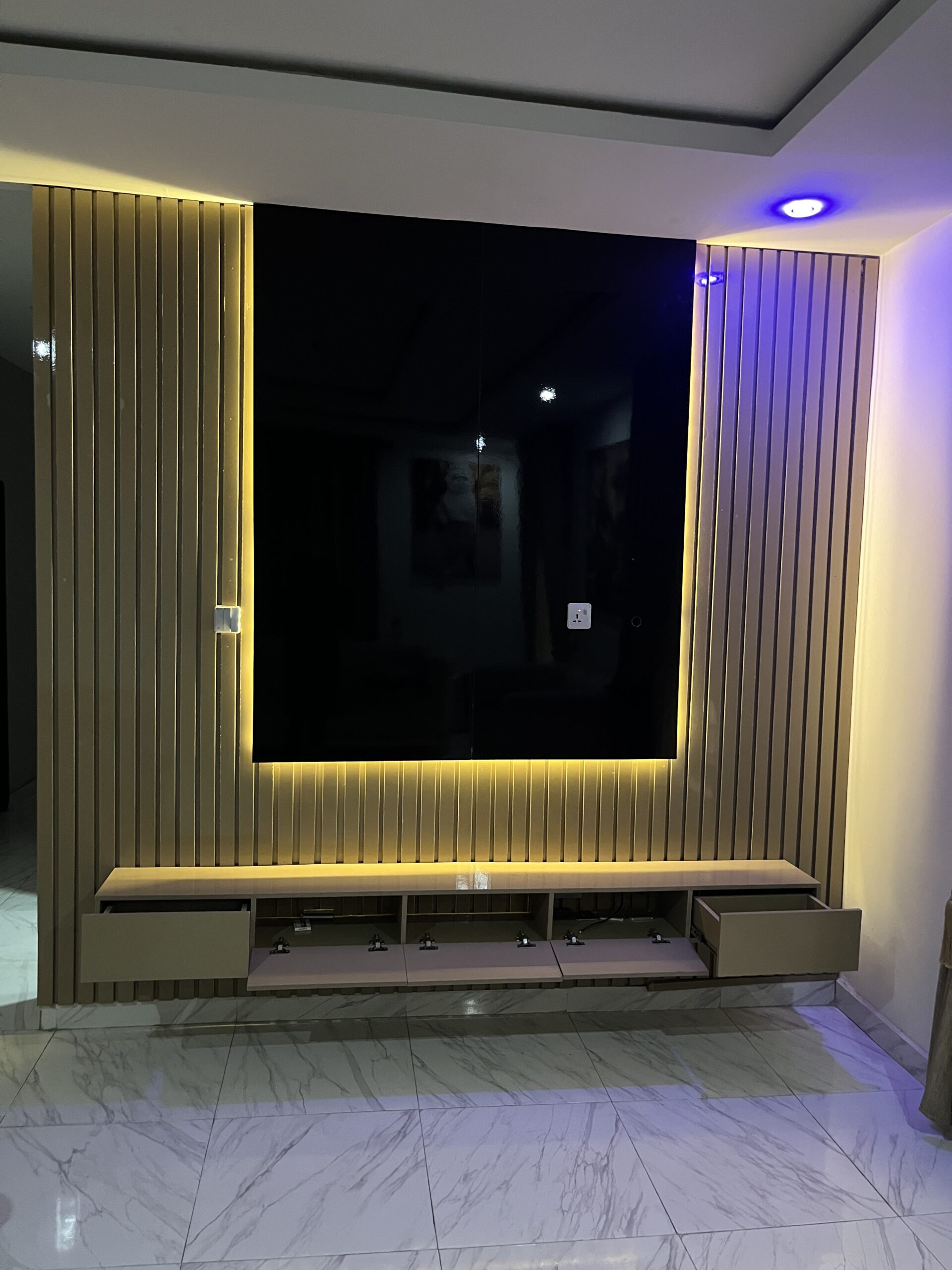 Neatly used TV console with good lighting